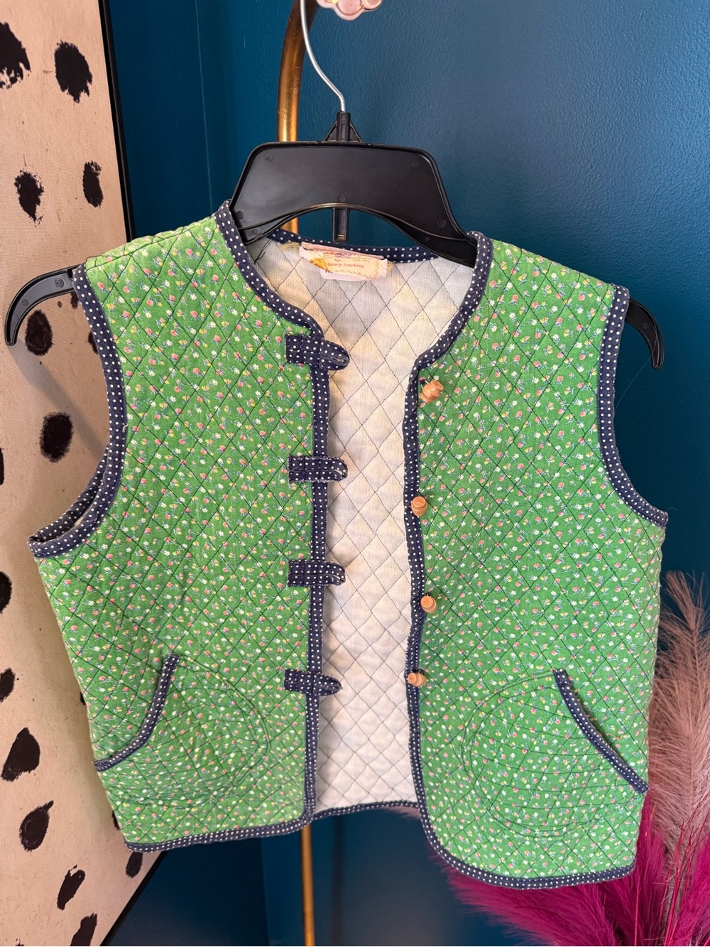 Quilted Green Sleeveless Vest with Navy Trim